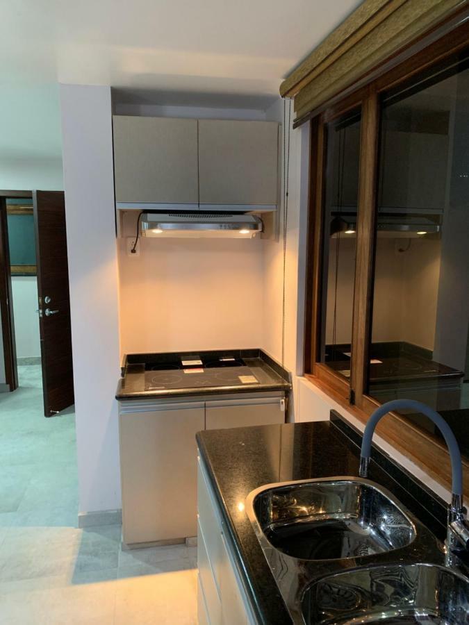 Chaperon Lodging Aparthotel Alausi Bagian luar foto