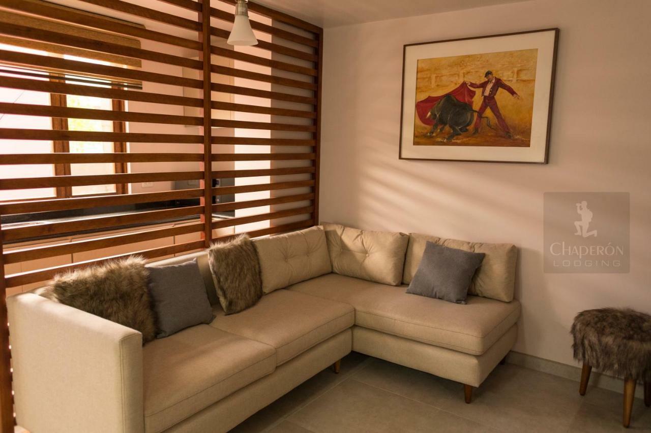 Chaperon Lodging Aparthotel Alausi Bagian luar foto