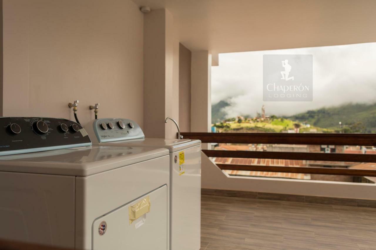 Chaperon Lodging Aparthotel Alausi Bagian luar foto